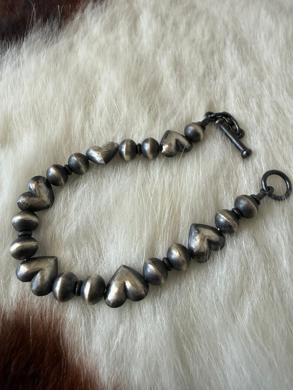Navajo handmade heart & rondell pearl bracelet